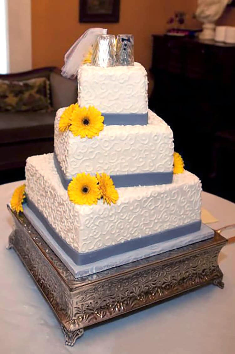yellow and gray wedding cake