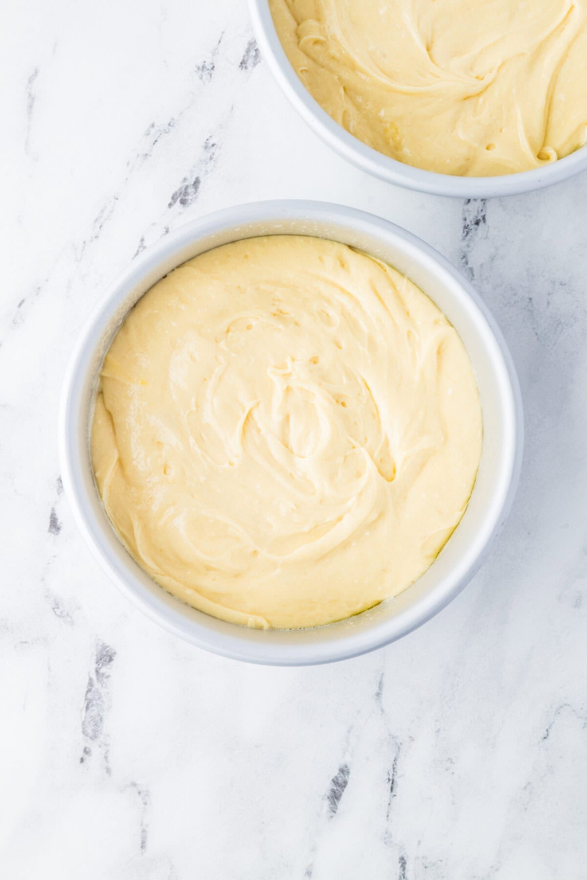 wedding cake batter in cake pans