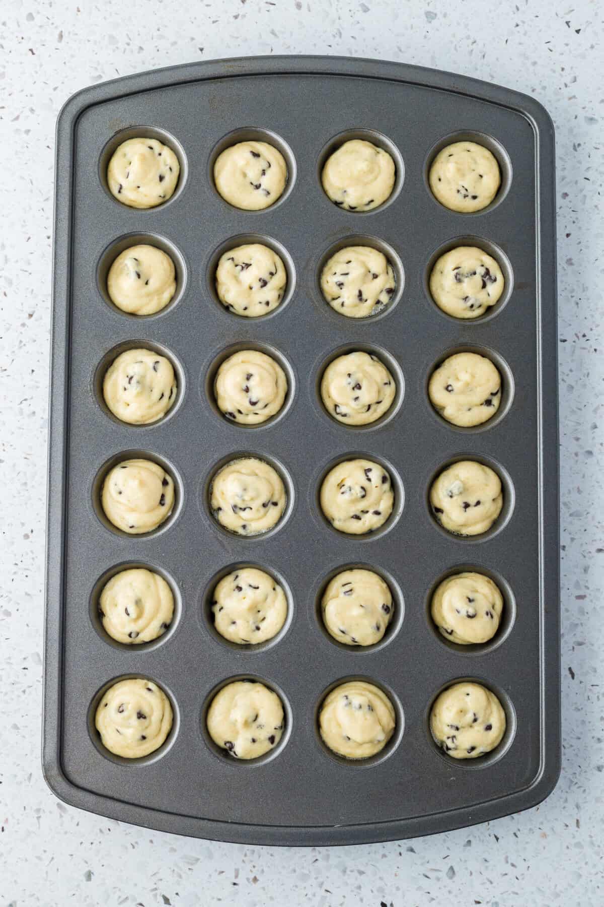muffin batter in mini muffin pan