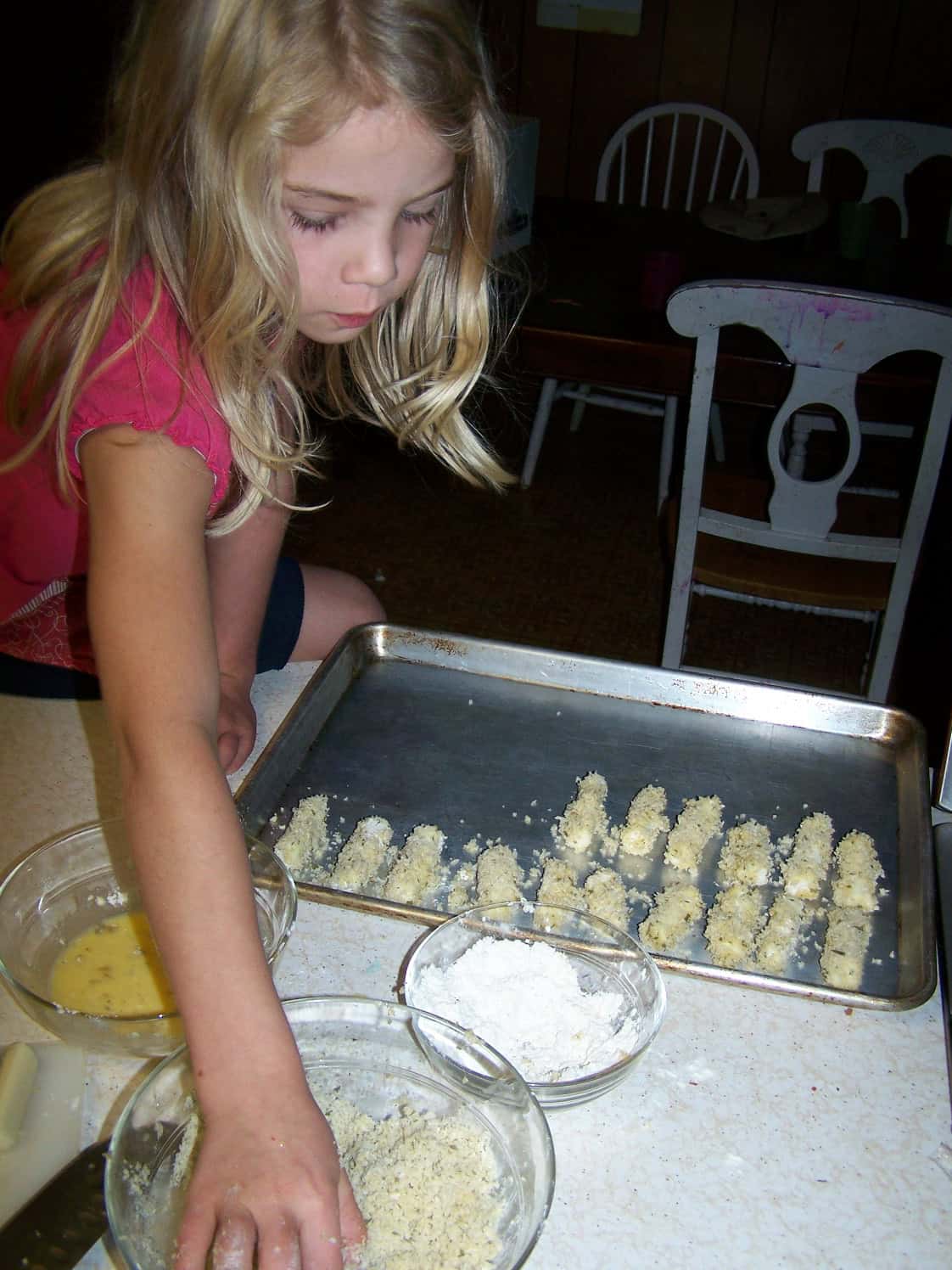 sarah helping me make homemade mozzarella cheesesticks