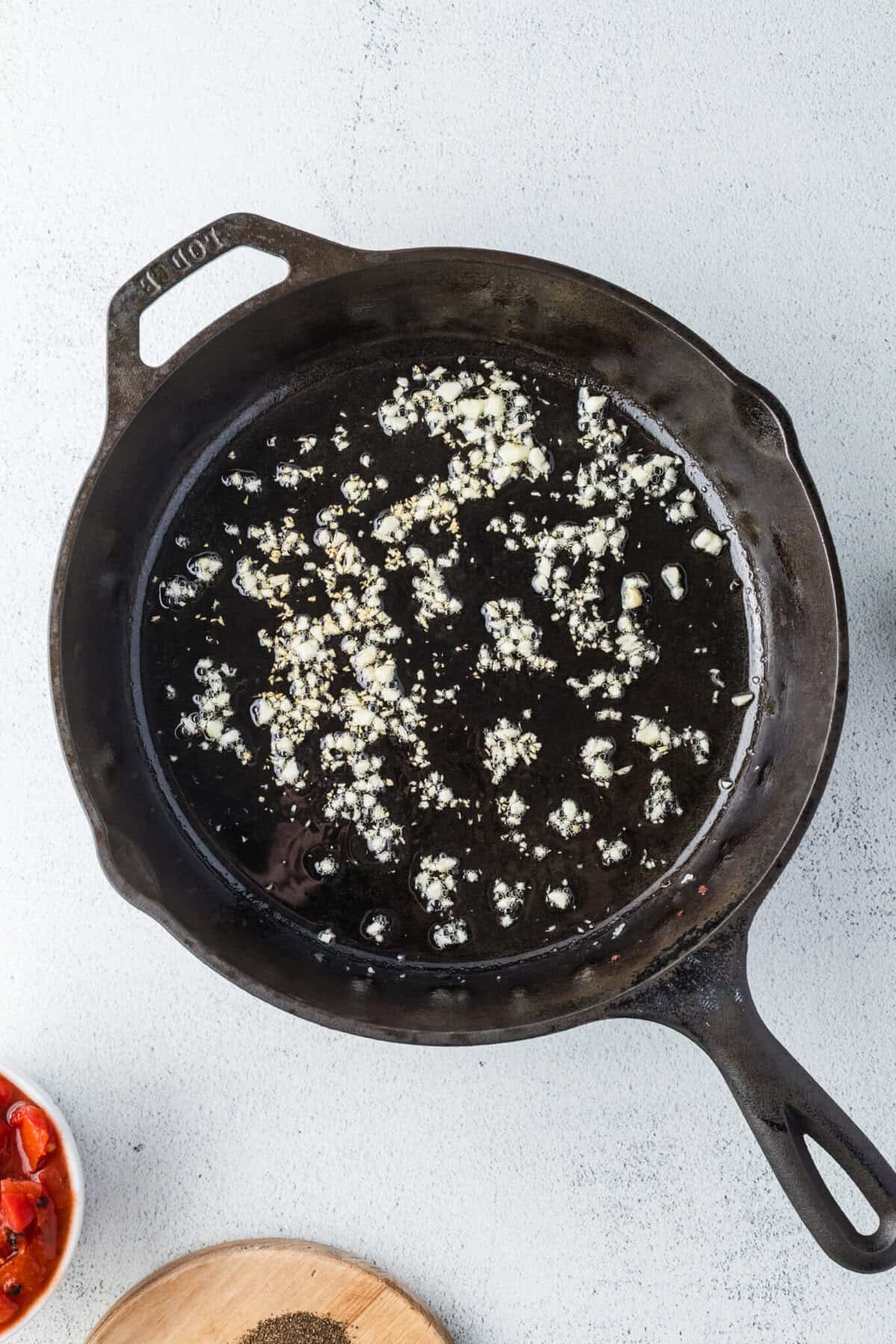 olive oil and garlic in a skillet