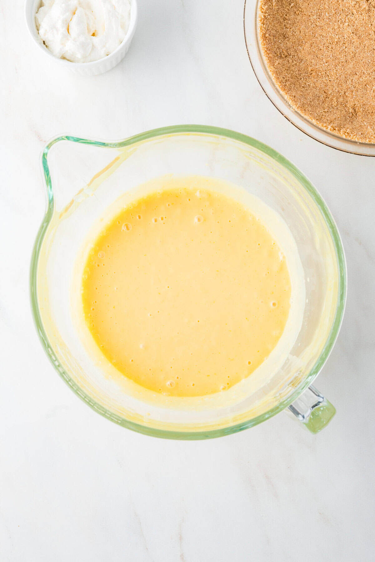 key lime pie filling in a clear bowl