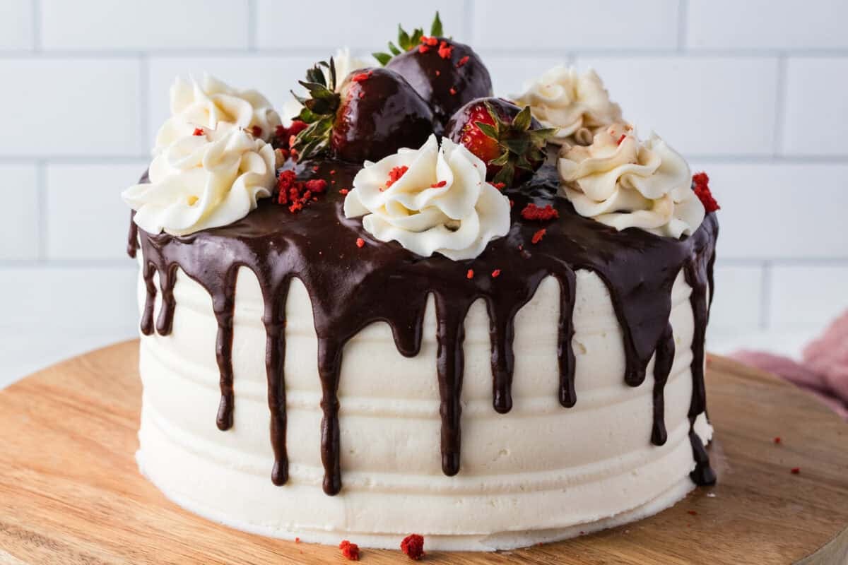 red velvet cake with strawberries and ganache