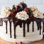 red velvet cake with strawberries and ganache