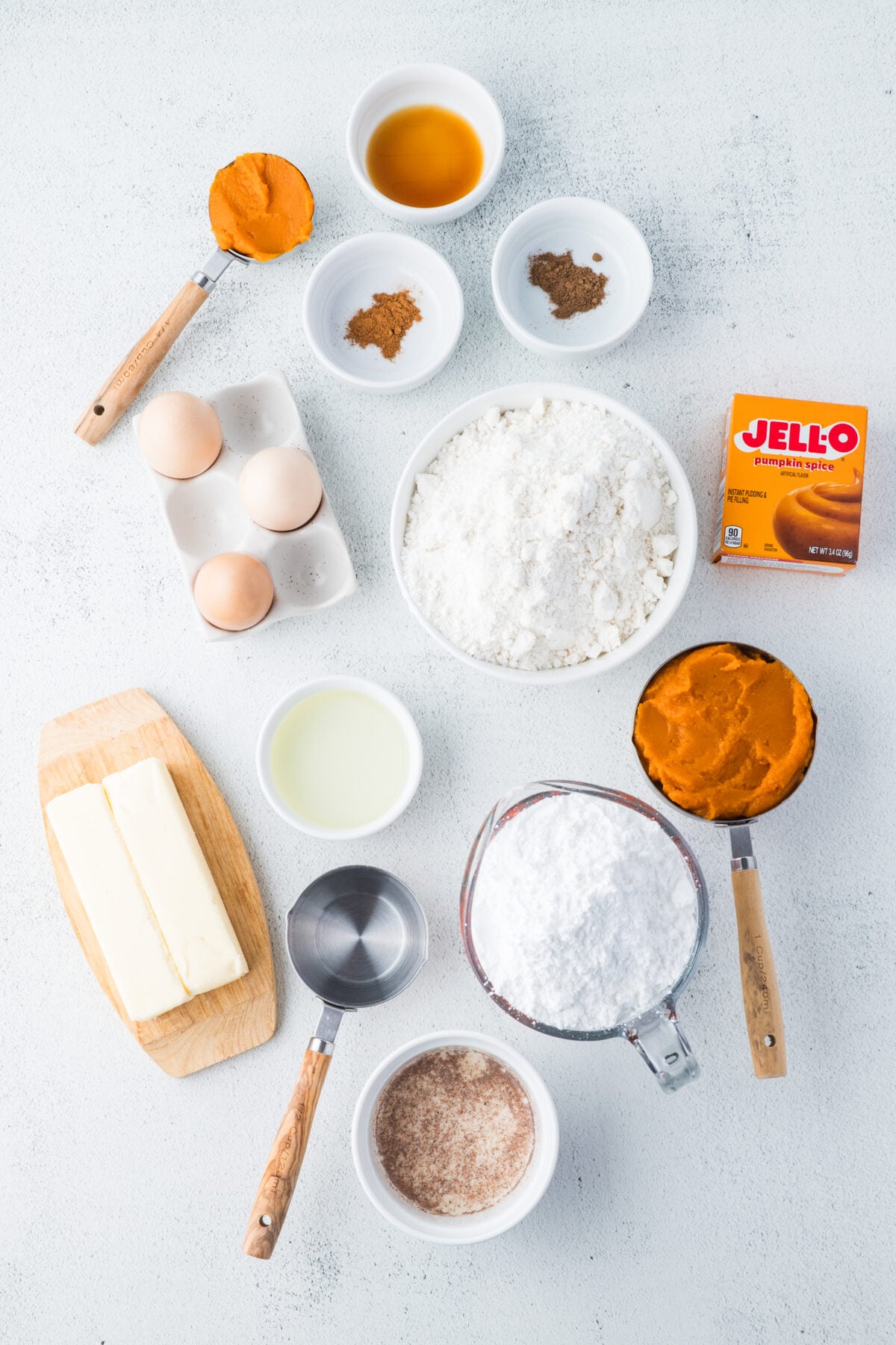 ingredients for pumpkin spice cupcakes and pumpkin spice frosting