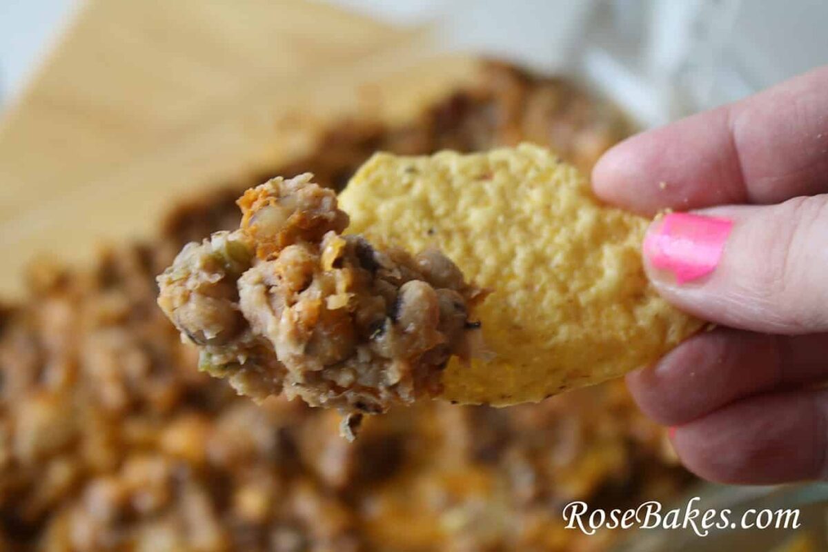 black eyed pea dip on a tortilla chip
