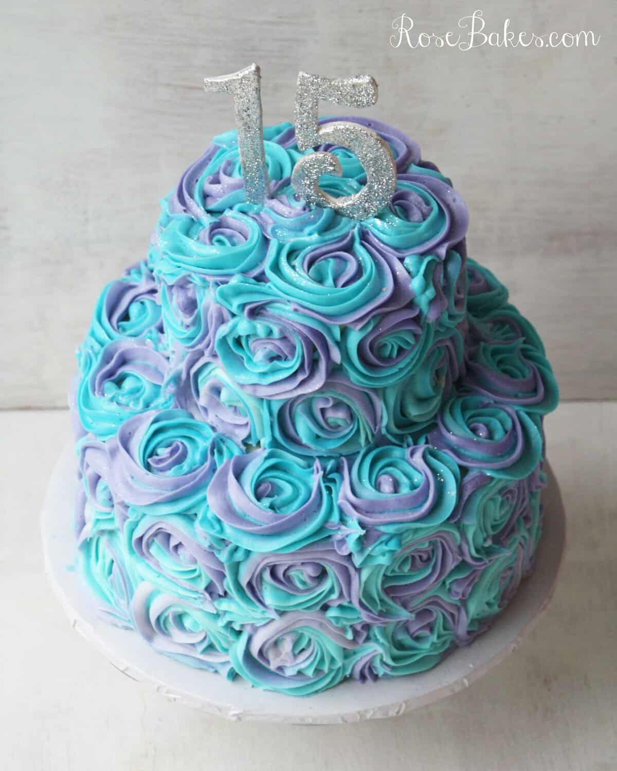 teal and purple buttercream roses cake