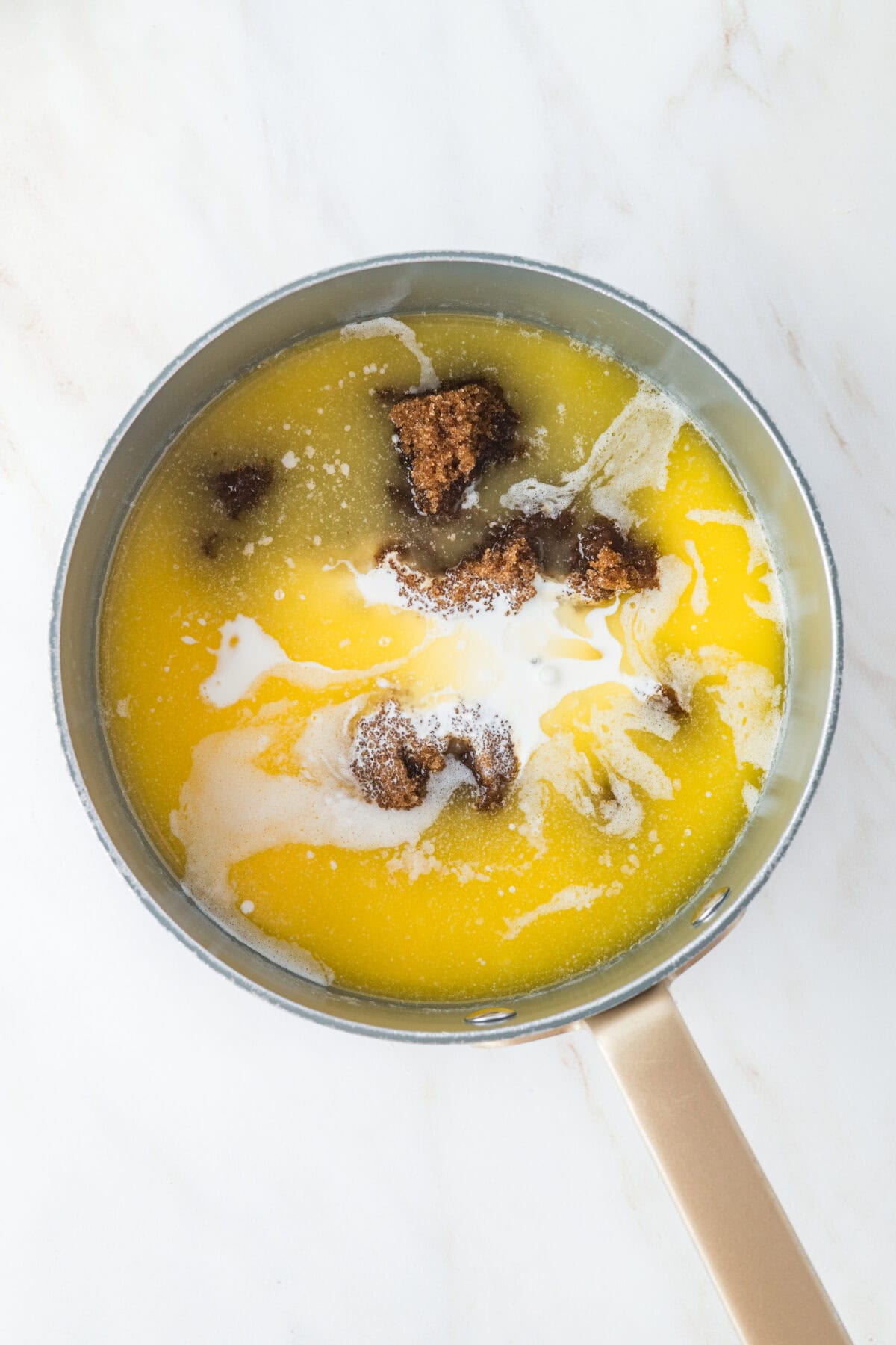 caramel icing ingredients in a pan