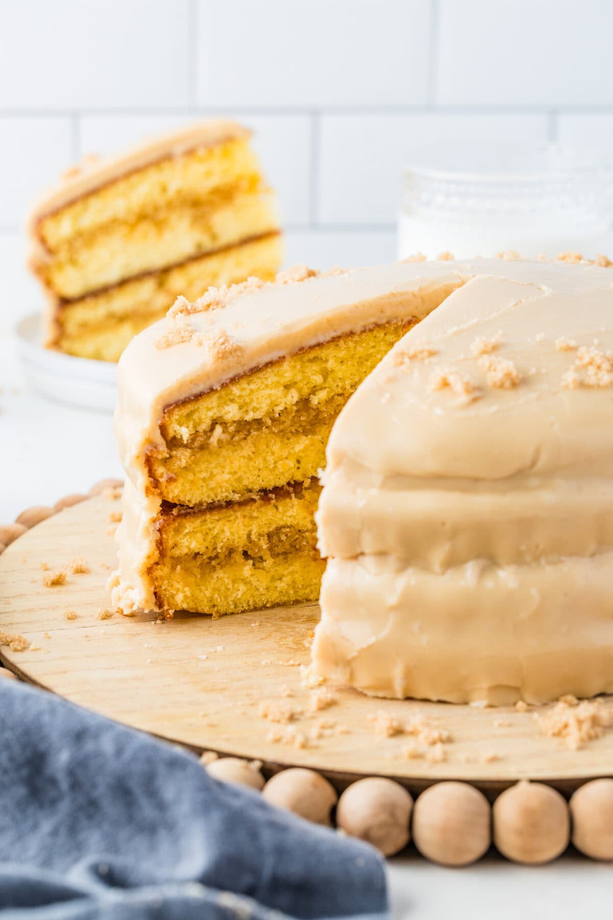 southern caramel cake with a slice missing