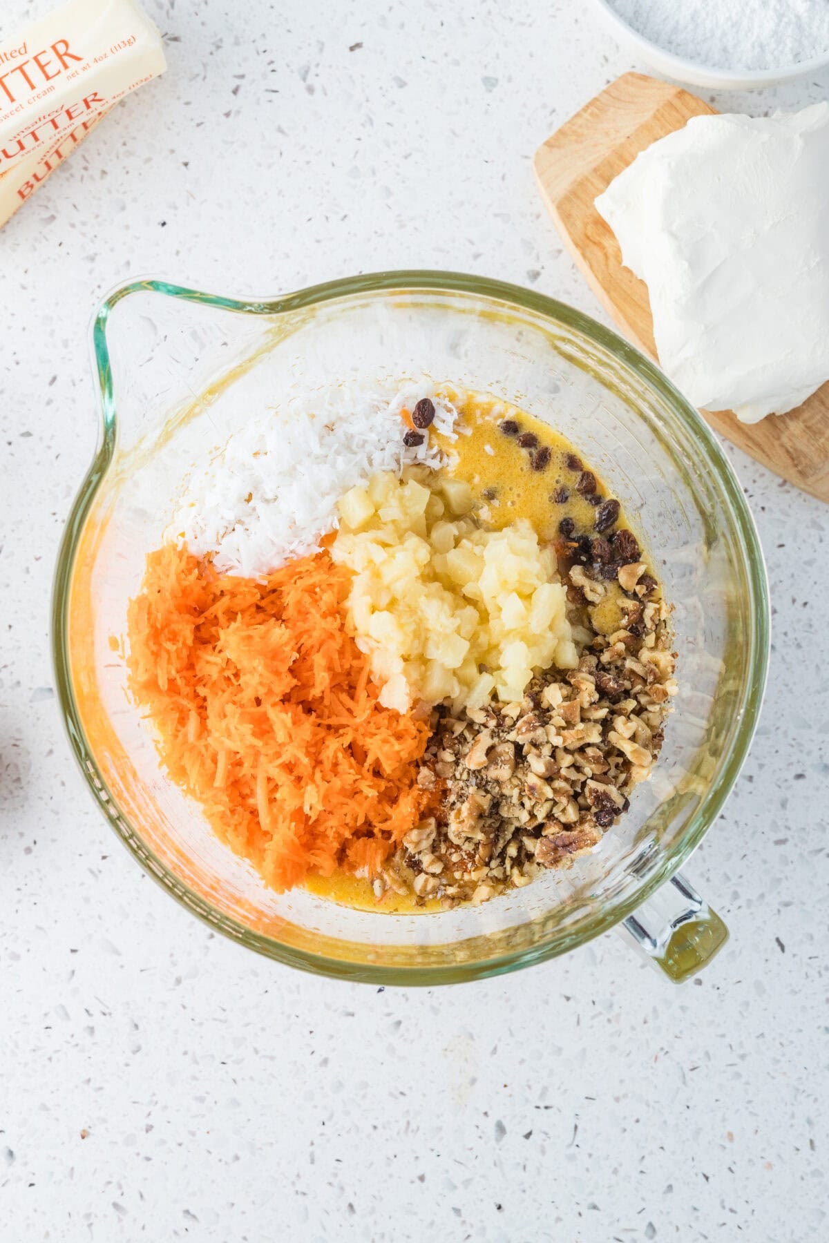 carrots, fruits and nuts added to carrot cake batter