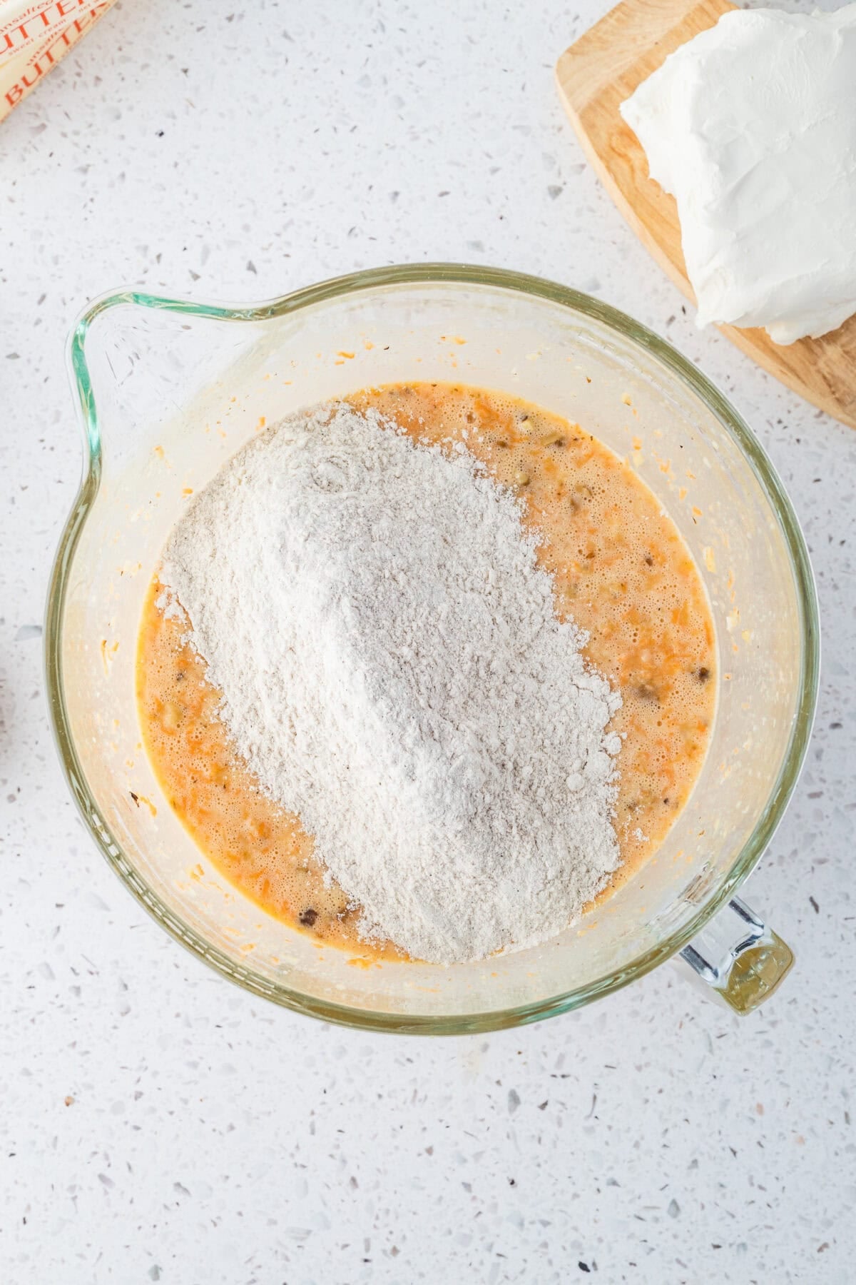 dry ingredients added to carrot cake batter