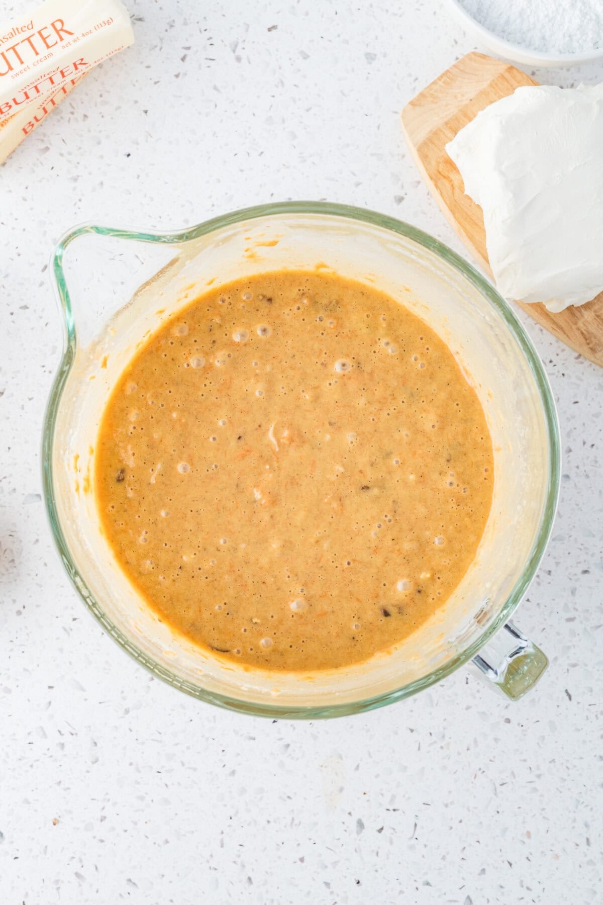 carrot cake batter in mixing bowl