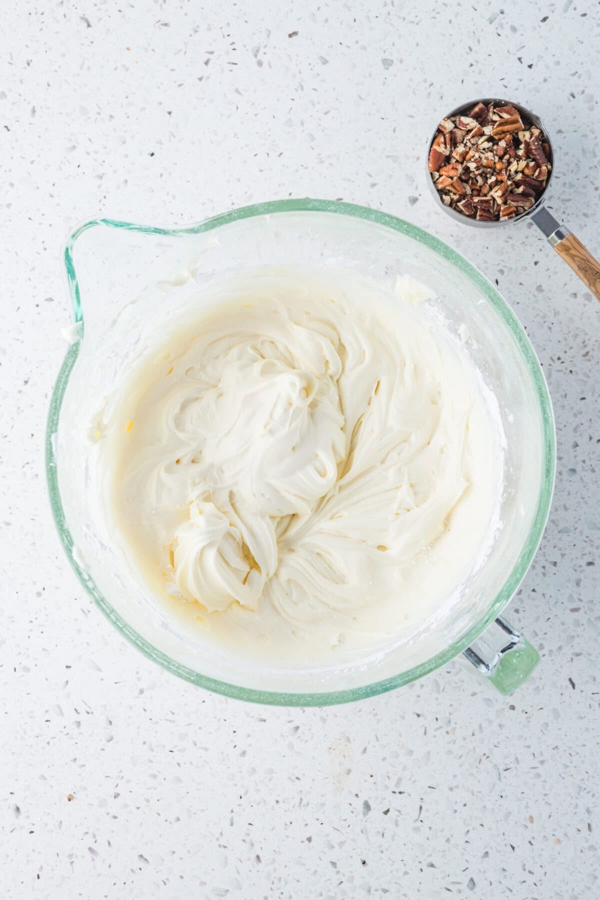 cream cheese frosting in mixing bowl