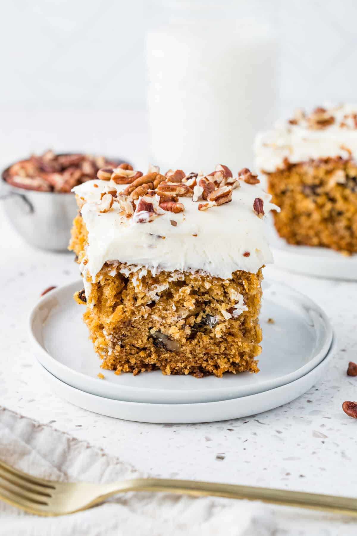 carrot cake on a white plate