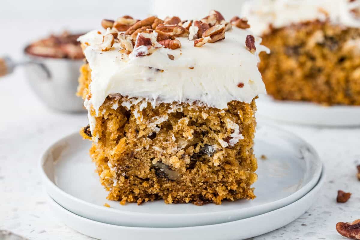 slice of easy carrot cake on a white plate