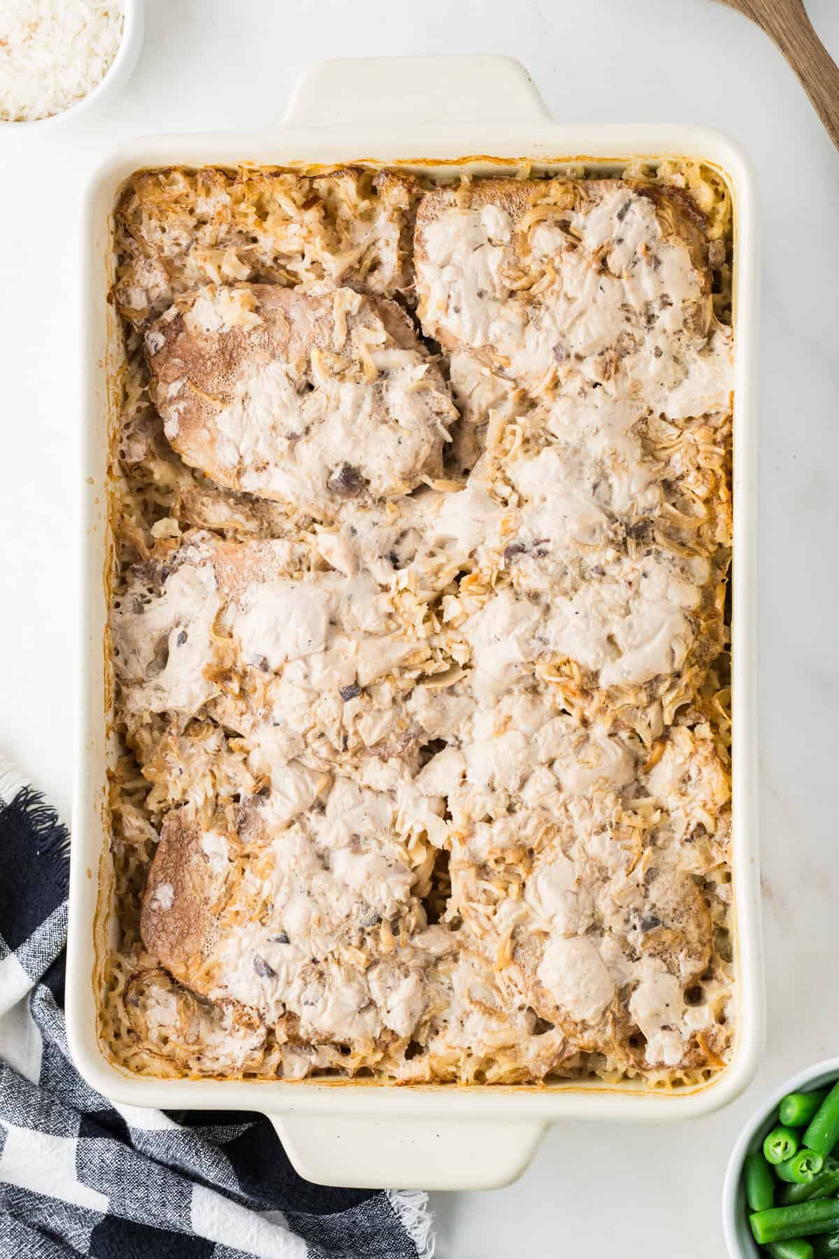 pork chops and rice in a baking dish