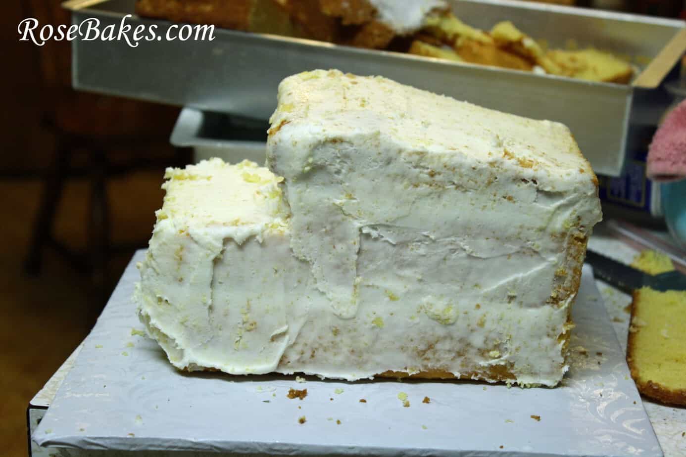 a Picture of the layered cake with frosting on it