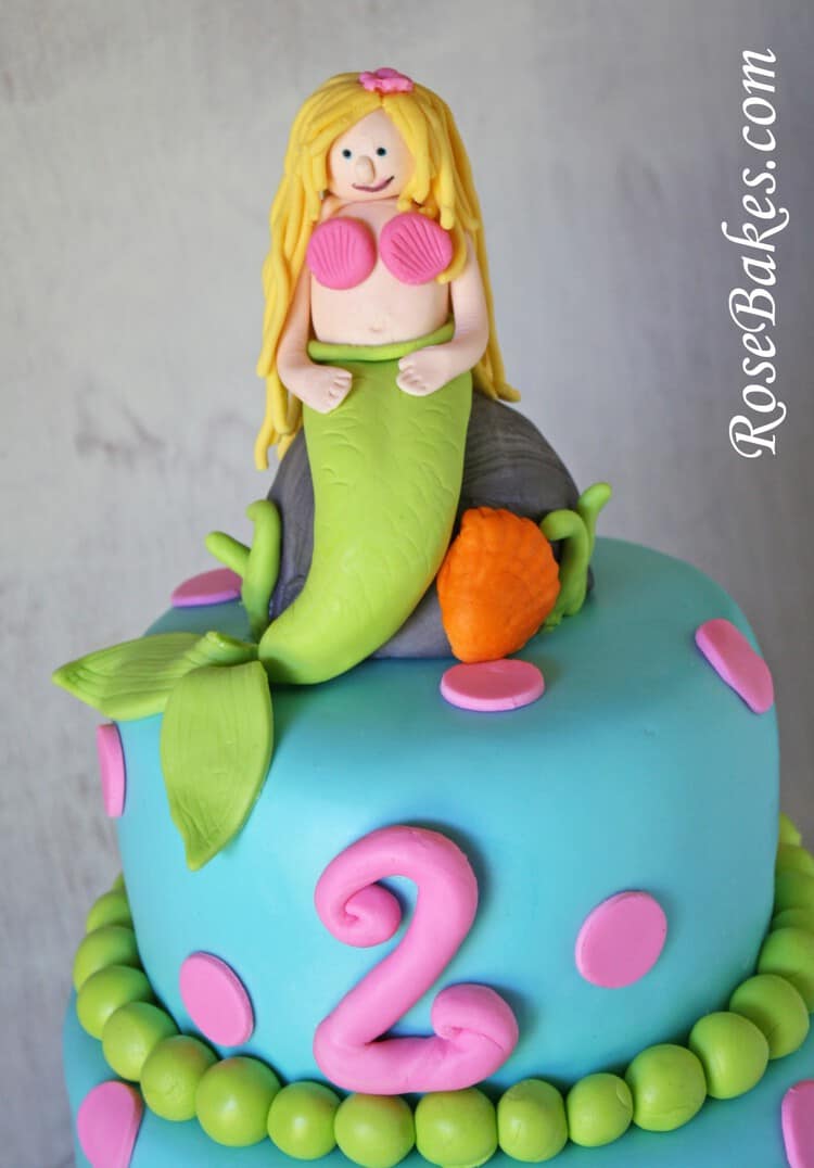 2 tiered cake with a mermaid on top