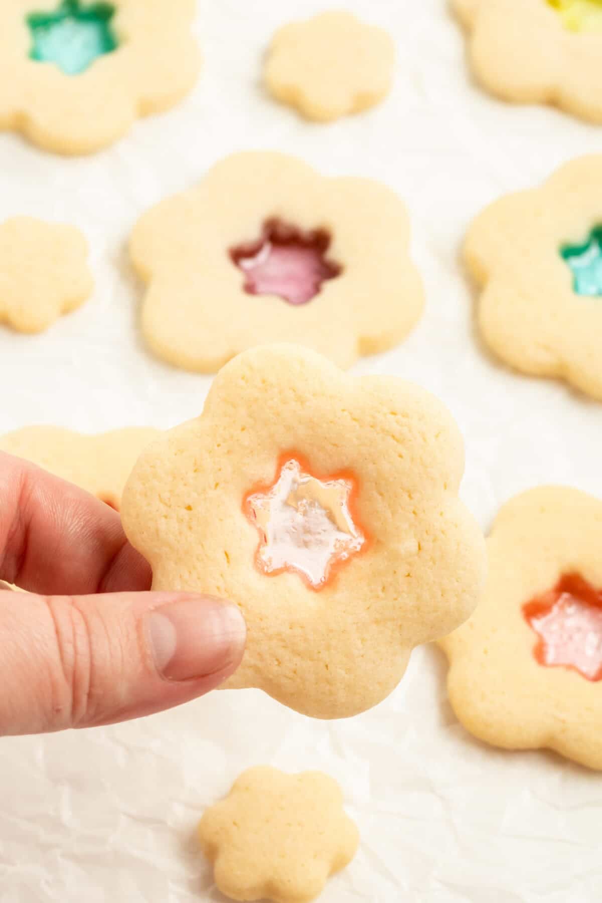 hand holding stained glass cookie