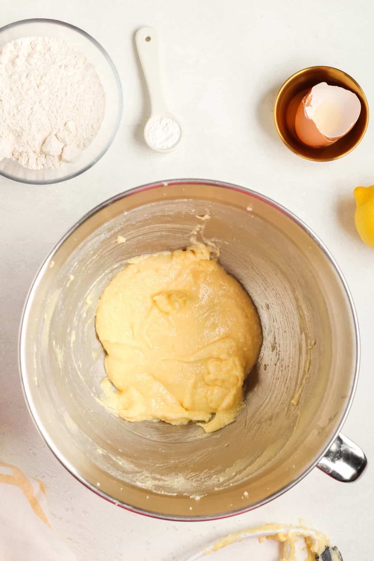 egg and extracts added to creamed butter and sugar