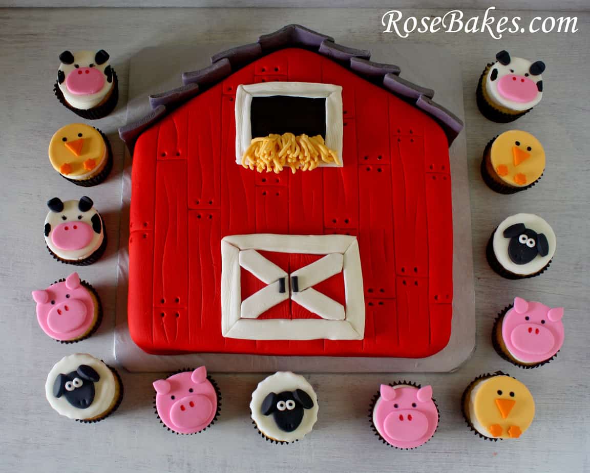 Barn cake with animal cupcakes around it
