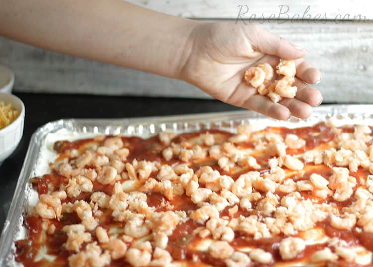 Sprinkle Shrimp on Sauce for Shrimp Dip Recipe