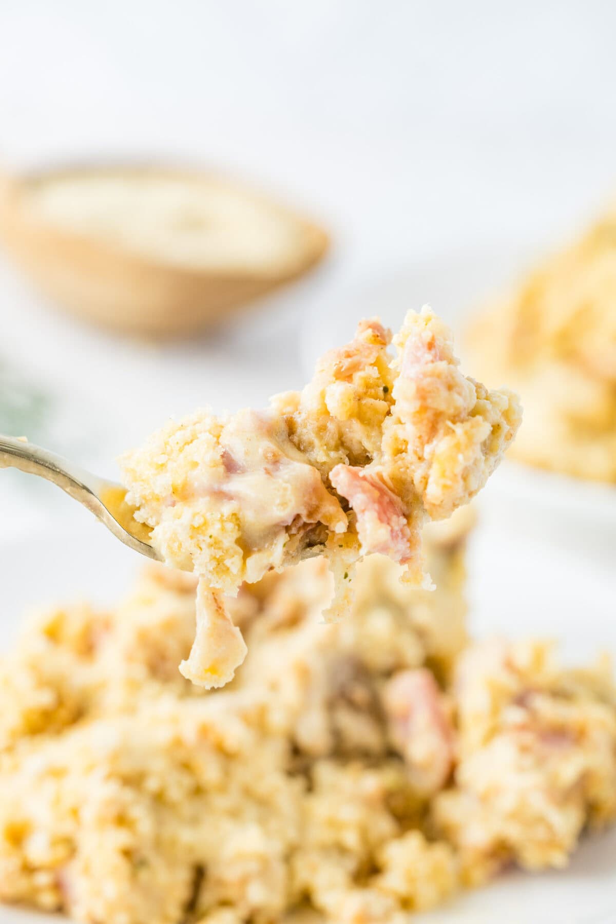 Delicious chicken casserole with ham, cheese, and a creamy sauce, inspired by Chicken Cordon Bleu, baked to perfection.