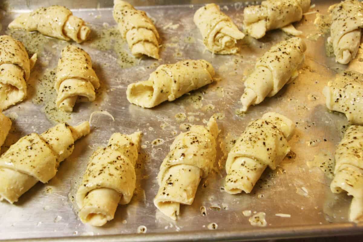 rolled up crescent rolls brushed with more garlic butter