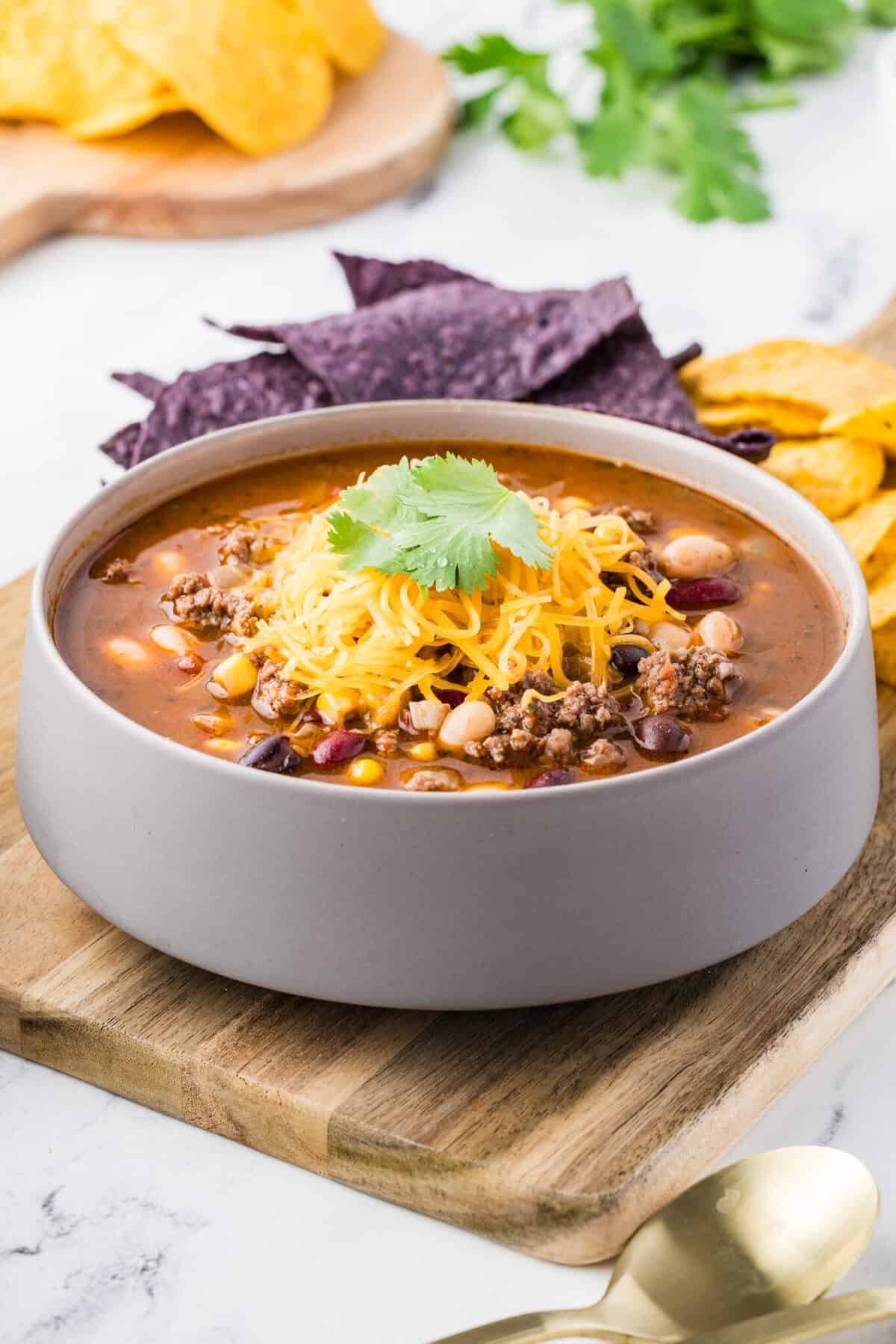 taco soup with cheese and cilantro