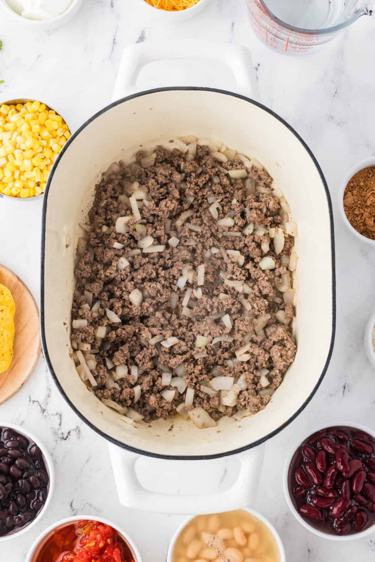cooked ground beef and onions in dutch oven