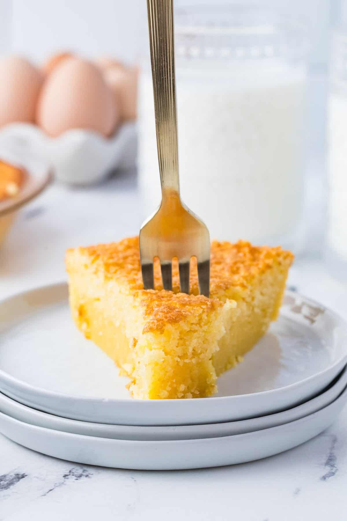 slice of buttermilk pie with a fork in it
