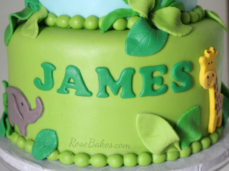 Brown Cookie Letters on Jungle Cake