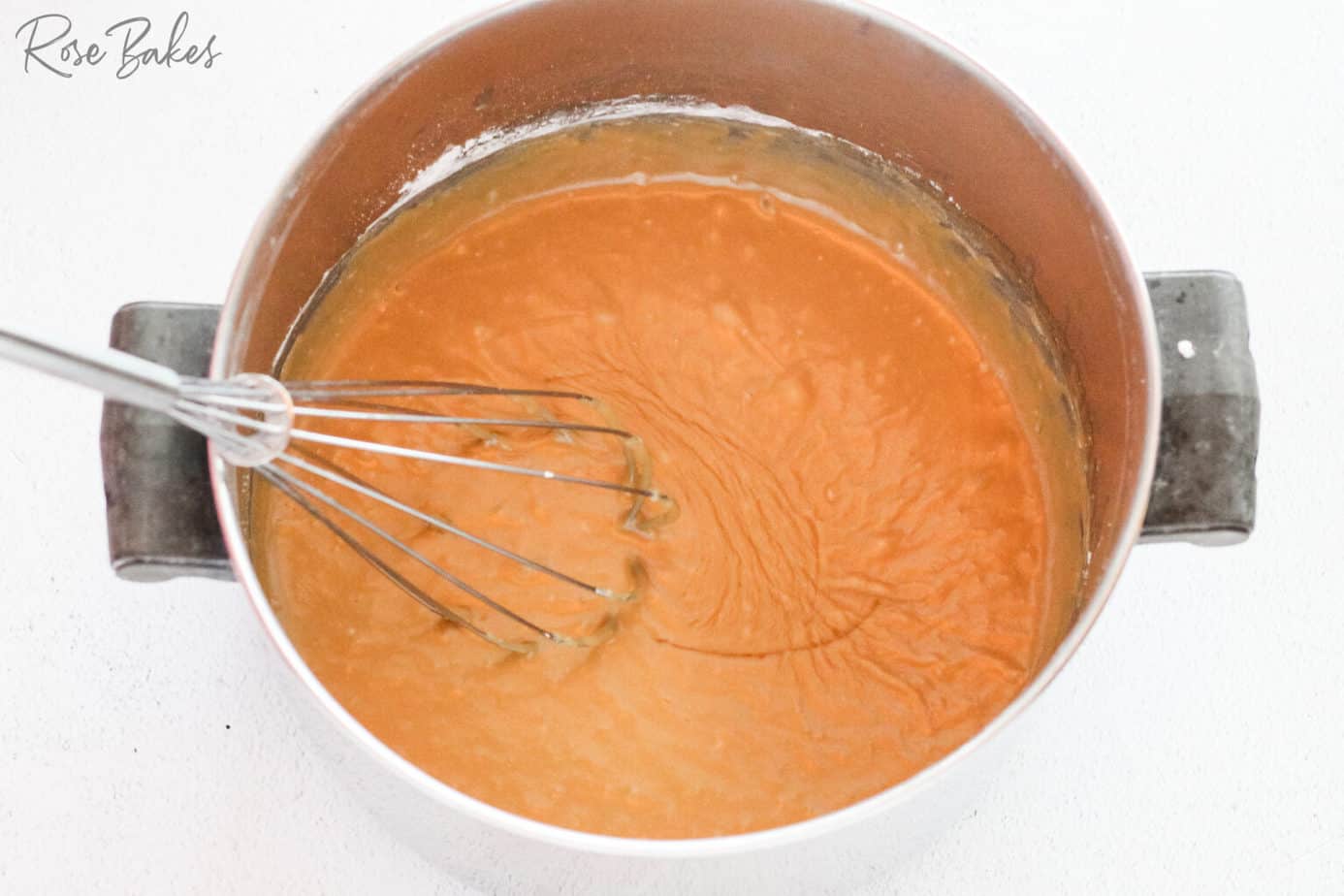 whisking the boiled ingredients 