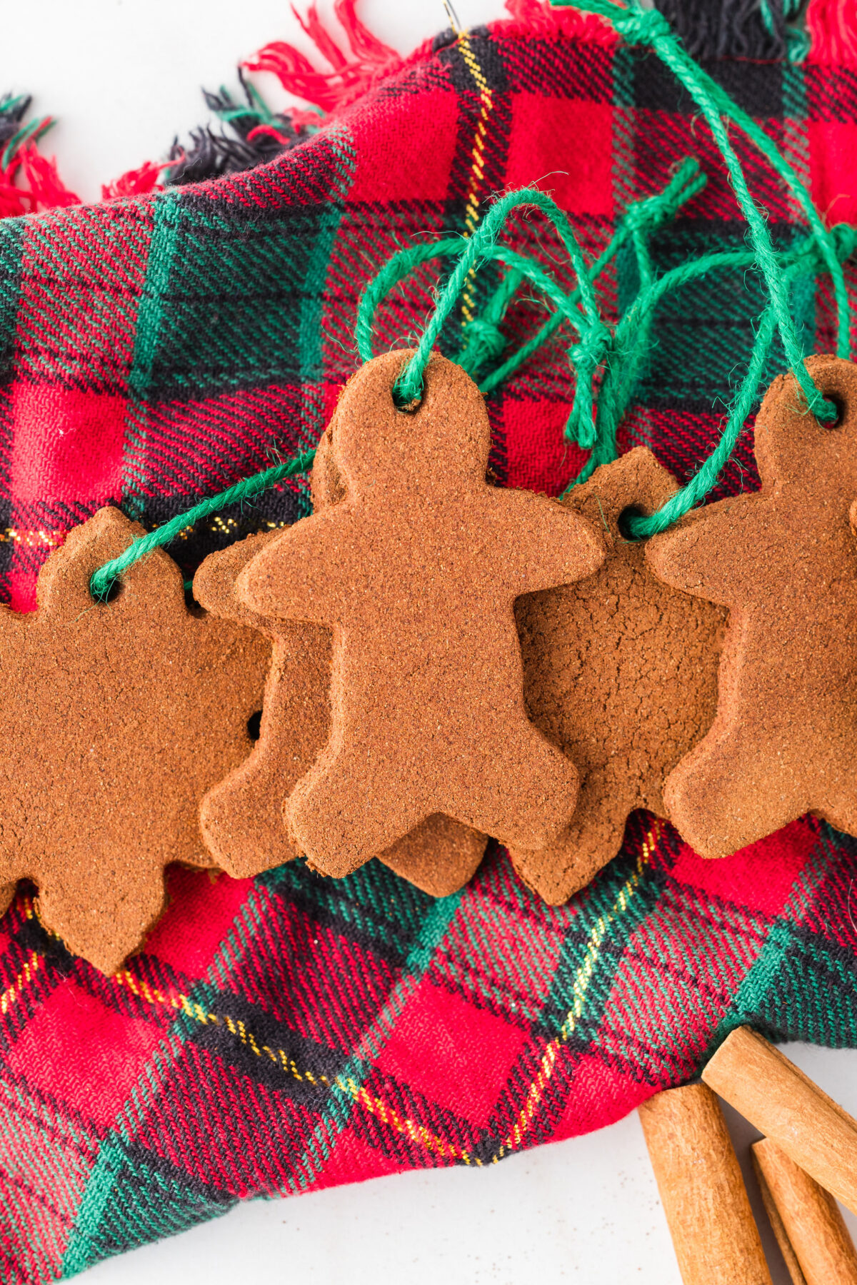 cinnamon ornaments on a plaid cloth