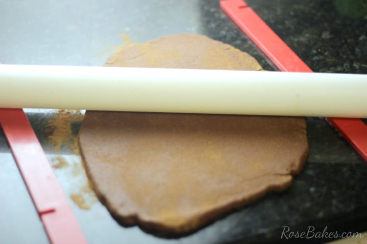 rolling out cinnamon ornaments dough