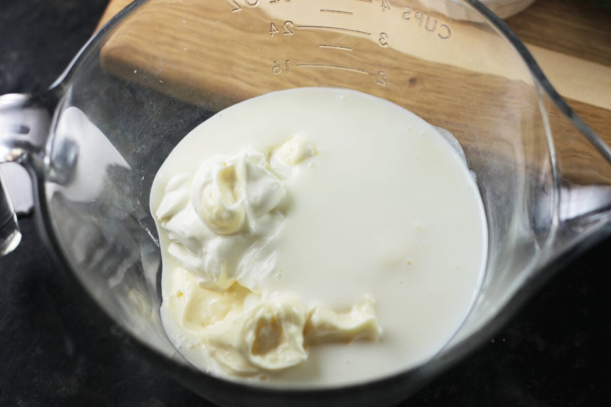 liquid ingredients for ranch dressing in a measuring dish