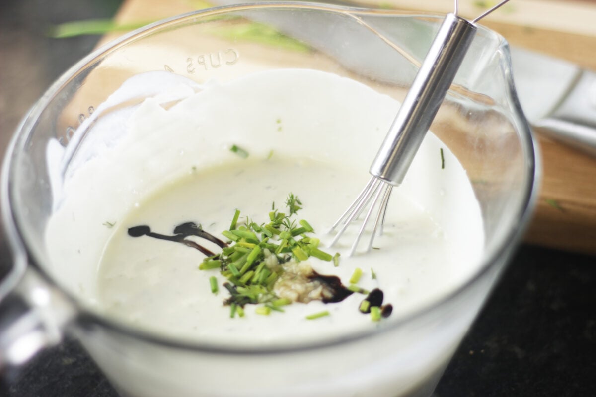 worcestershire and fresh herbs added to liquid ingredients