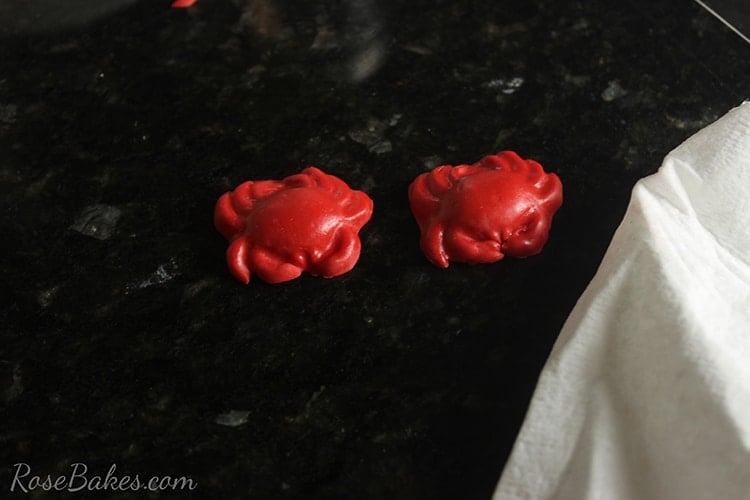 Rub with shortening to remove corn starch