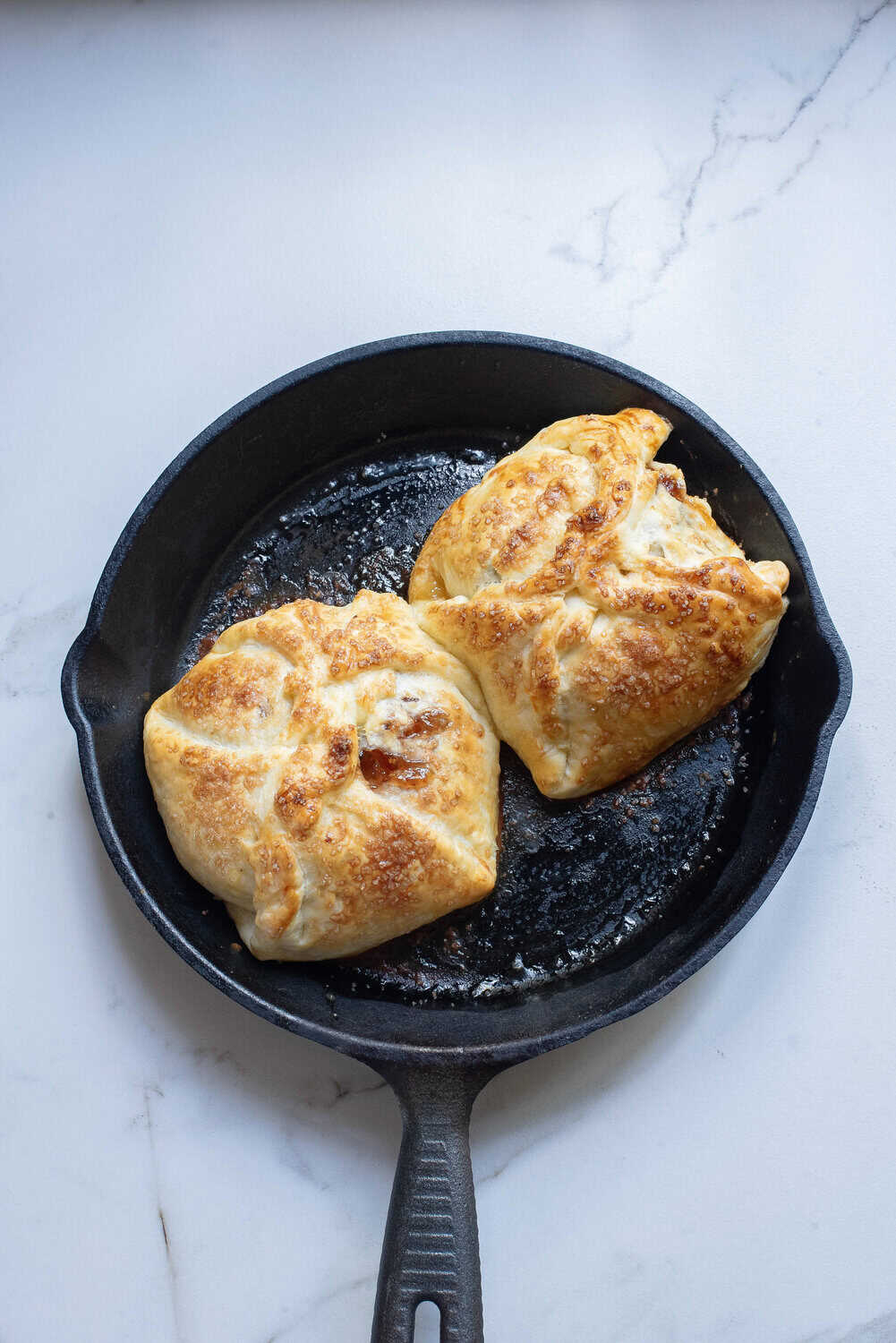 baked brie golden brown in a skillet
