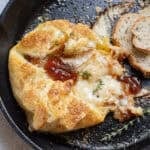 Baked Brie in Puff Pastry with Fig Jam in a skillet