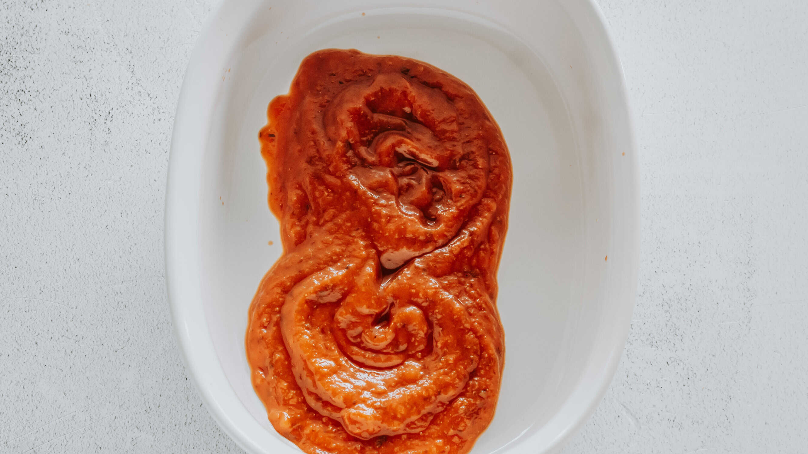 pizza sauce in casserole dish