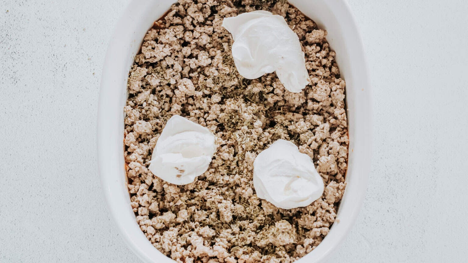 whipped cream cheese over ground beef