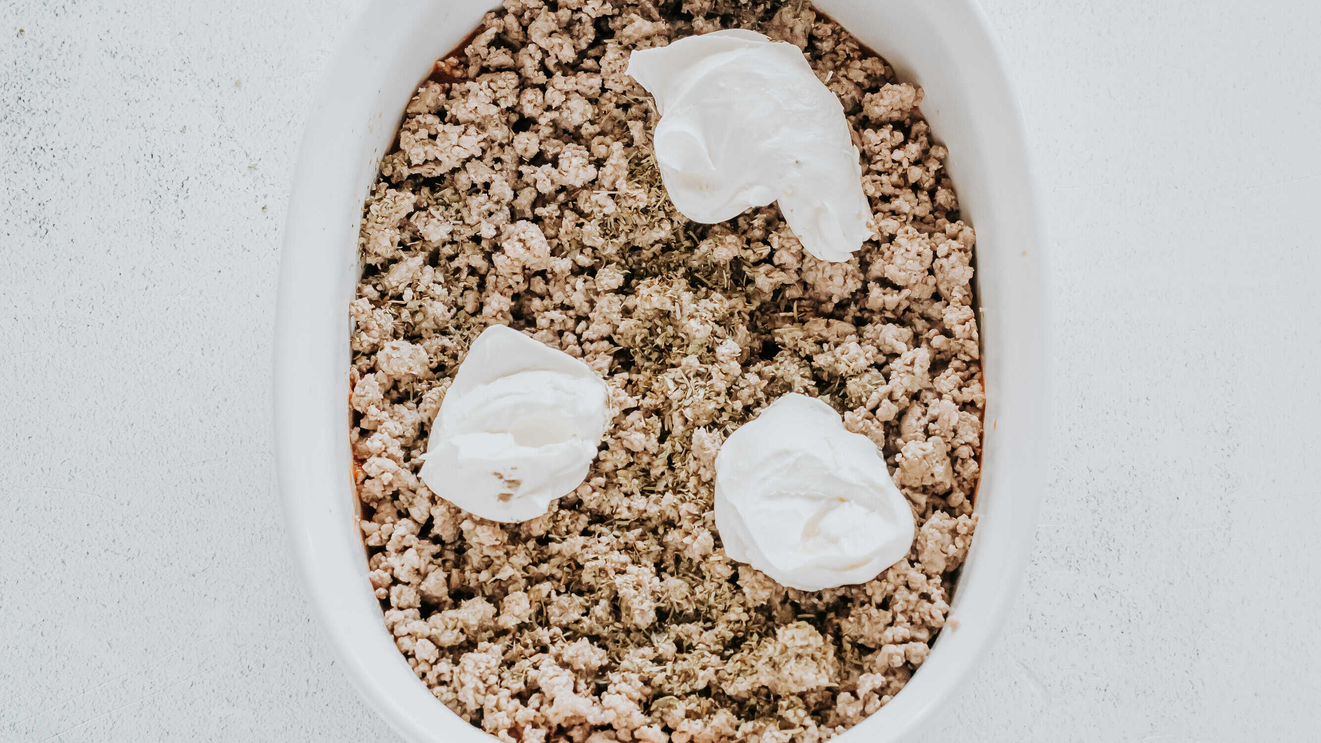 whipped cream cheese over ground beef