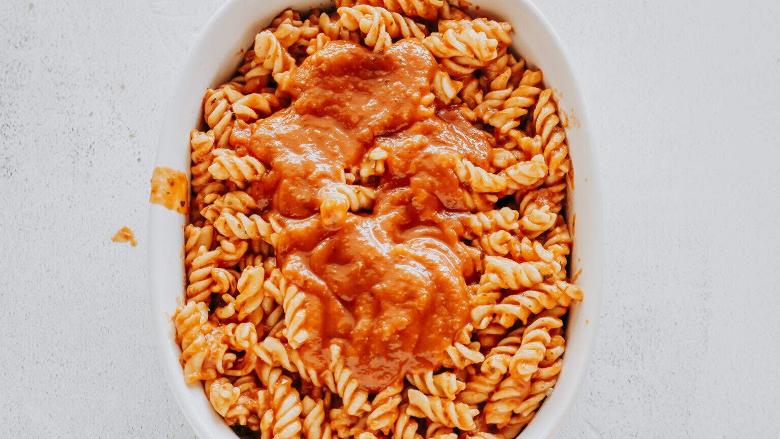 extra pizza sauce over pasta