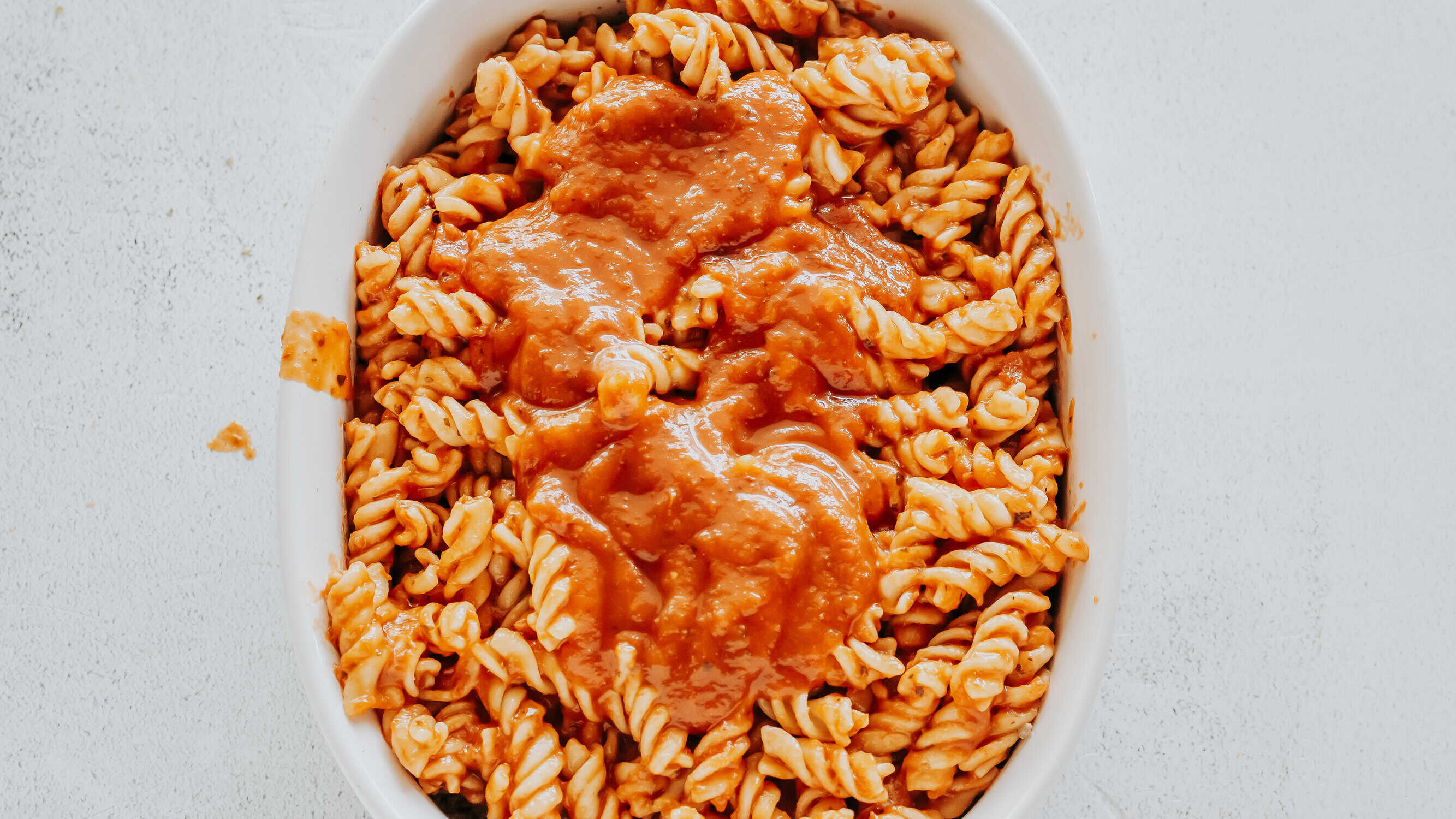 extra pizza sauce over pasta