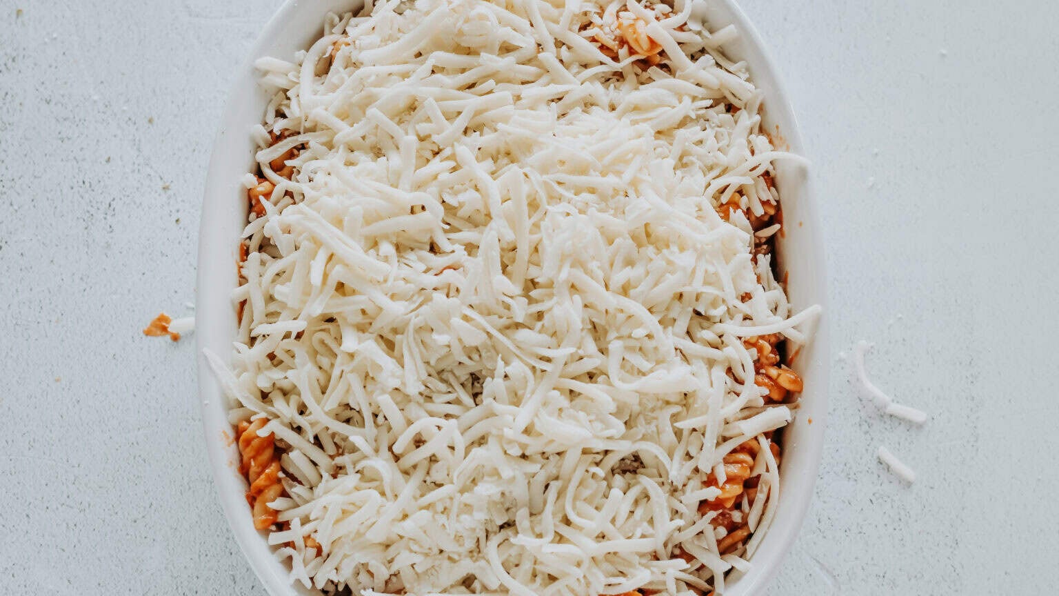 mozzarella cheese over pasta
