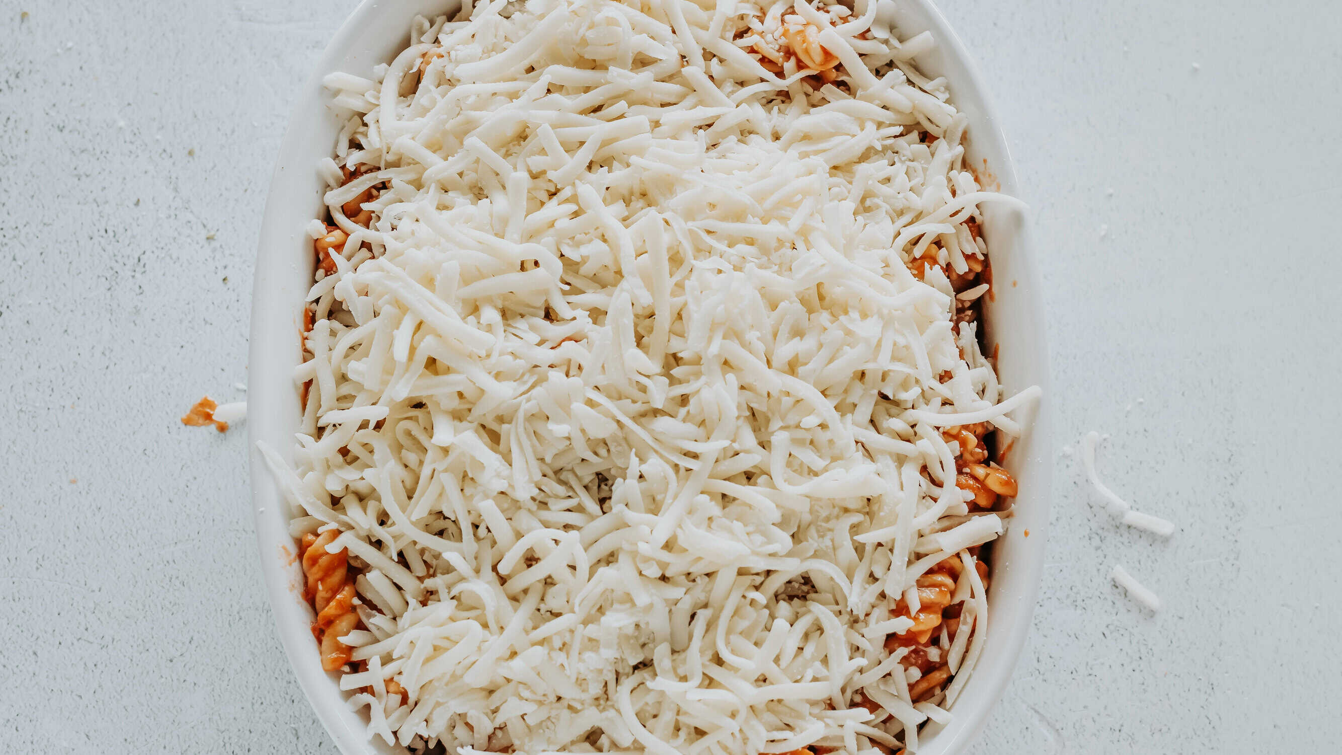mozzarella cheese over pasta
