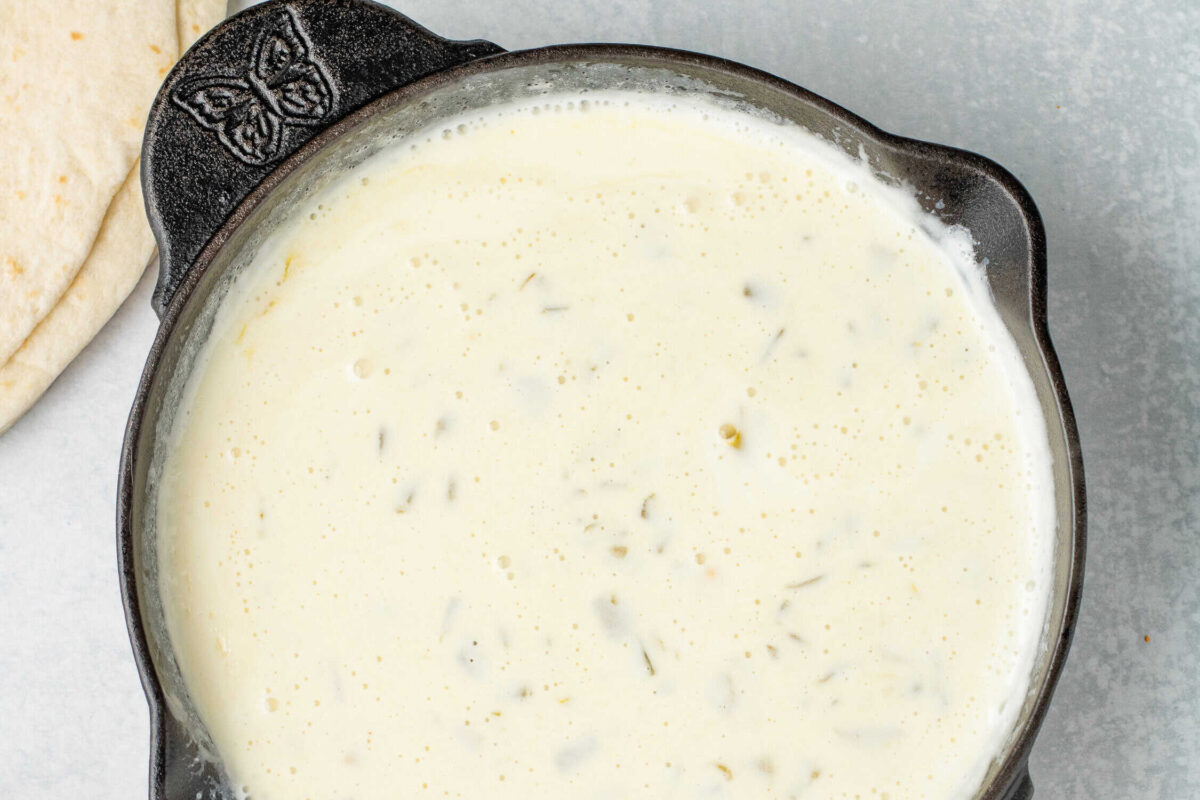 mexican queso dip in a skillet