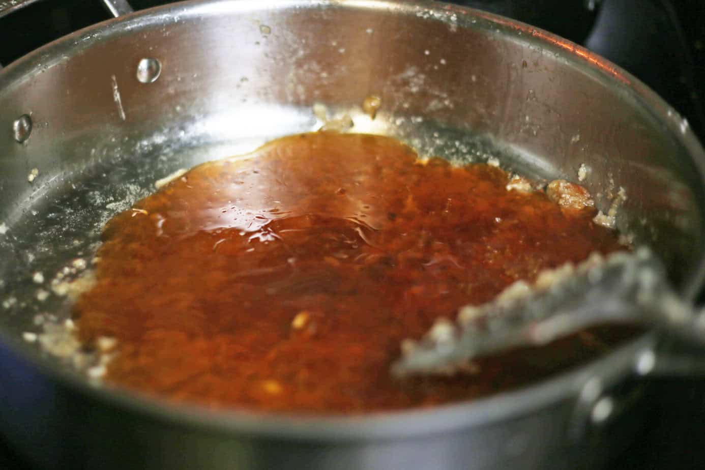 orange sauce in skillet