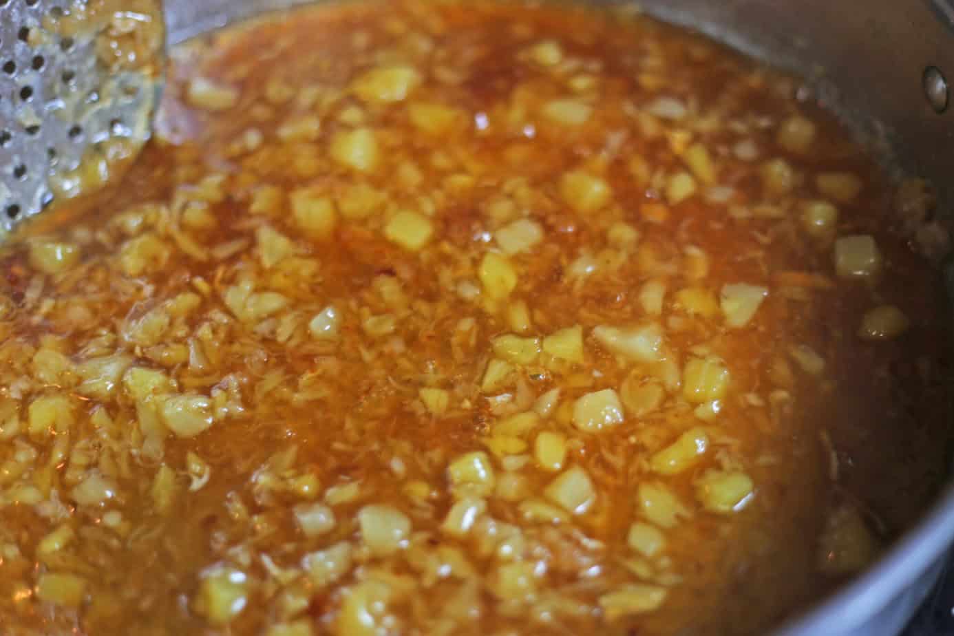 pineapple sauce mixed up in a skillet